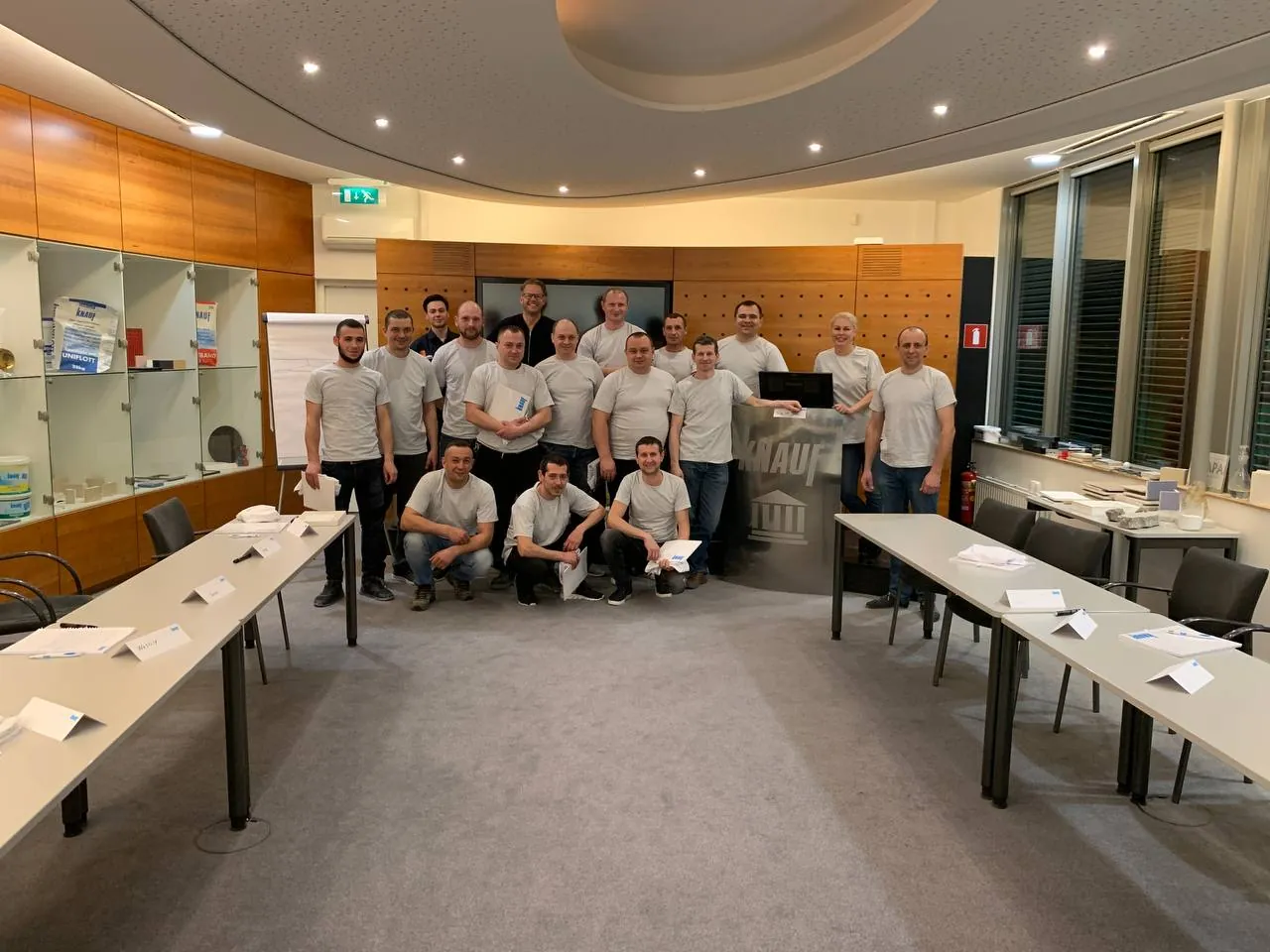 Het team van Global Bouw in bedrijfskleding